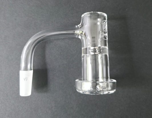 Clear glass quartz banger on a dark grey background