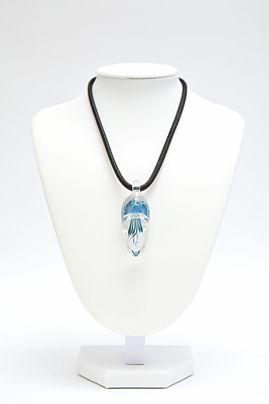 Necklace with a pendant on a white mannequin bust against a white background