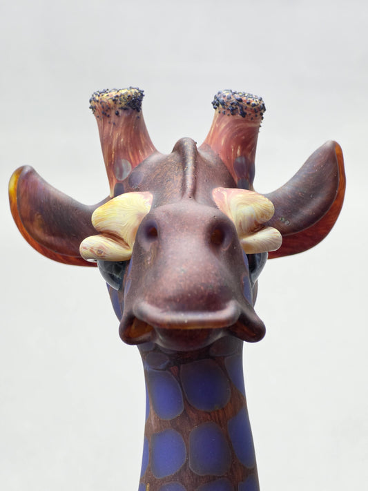 Robertson Glass Giraffe-shaped glass pipe on a light grey background