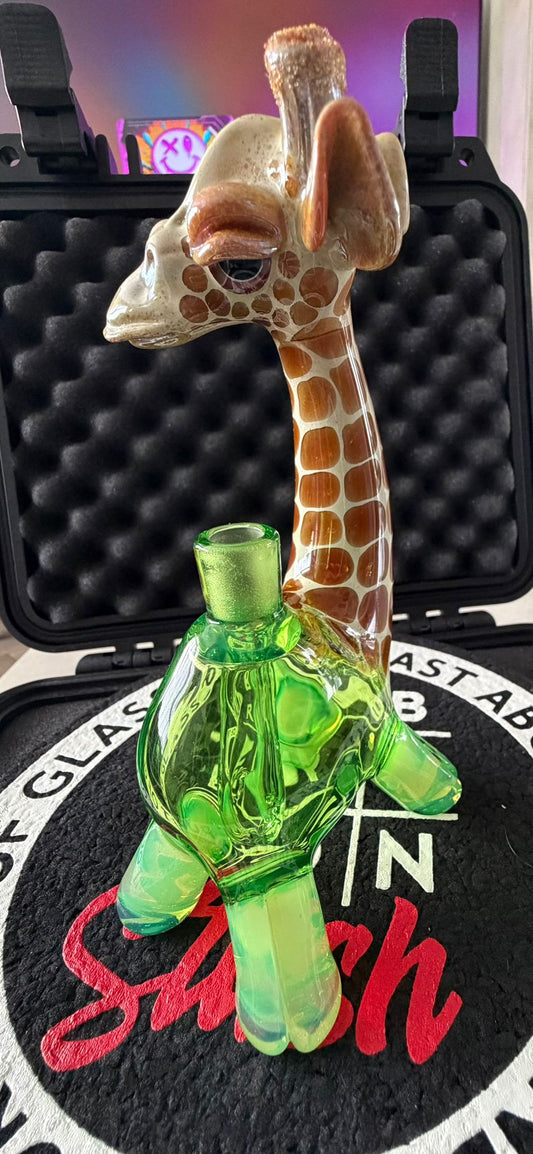 Robertson Glass Glass giraffe rig on a black mood mat surface with text
