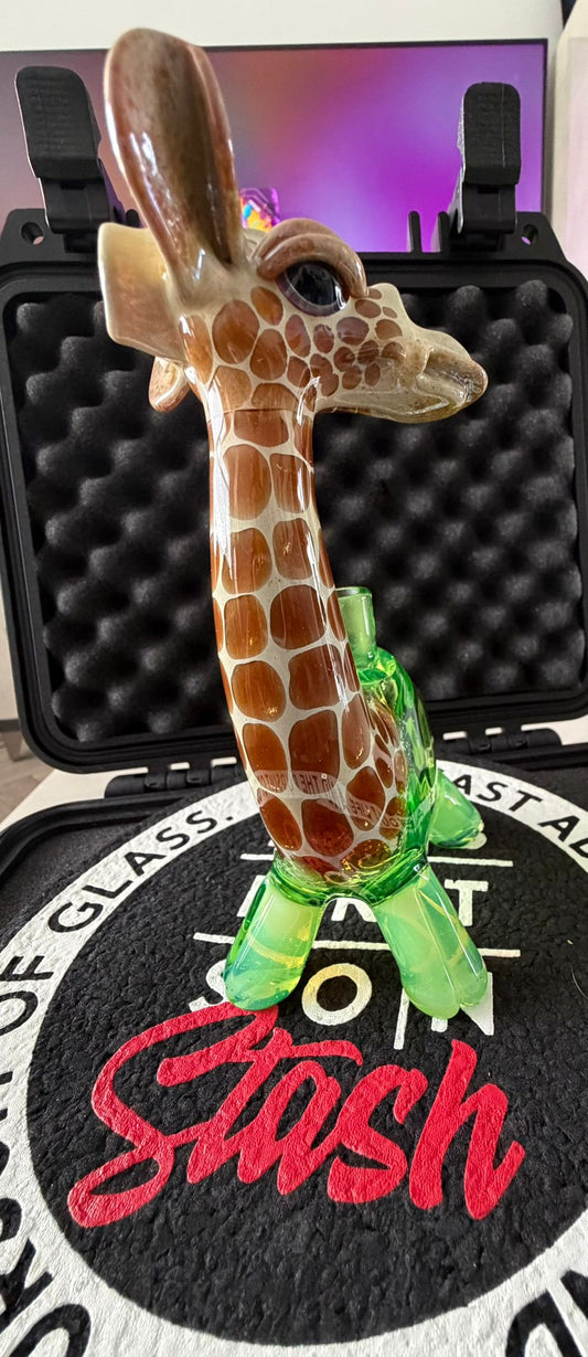Robertson Glass Glass giraffe rig on a black mood mat surface with text