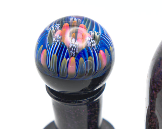 Chilling Glass Jack Stack glass pipe with a colourful glass knob on a white background
