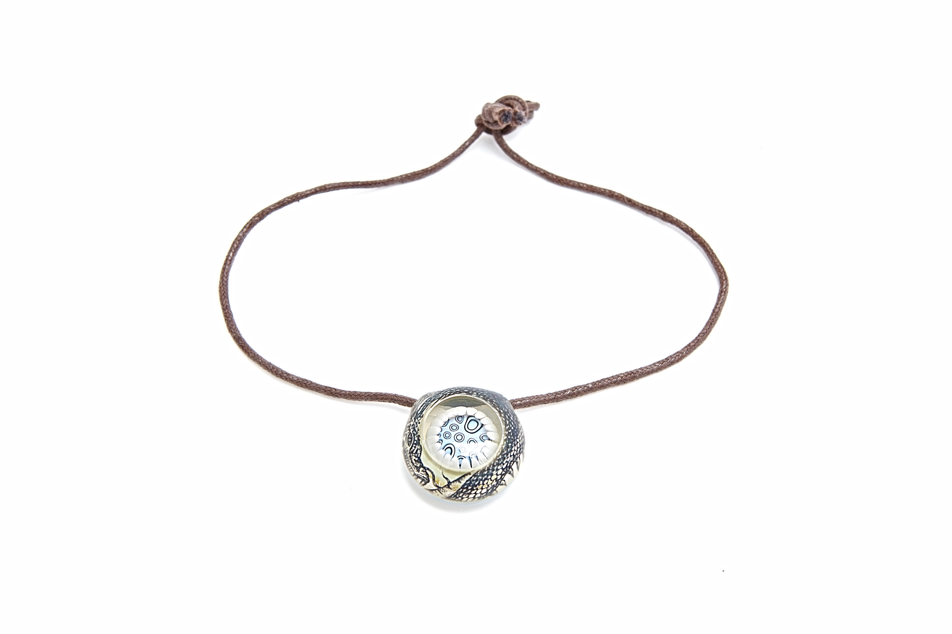 Bracelet with a circular pendant featuring a blue gemstone on a white background